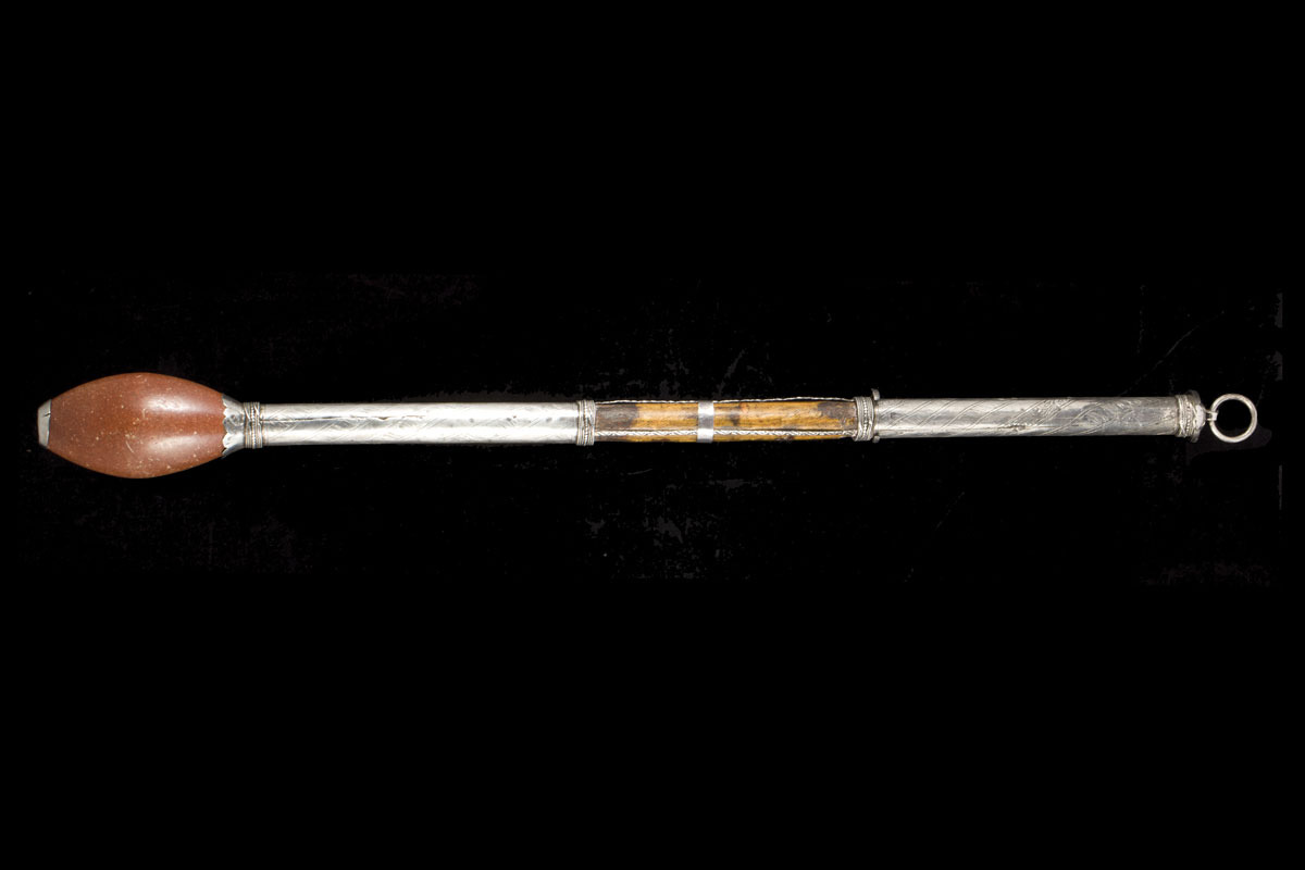 A 18th century Balkan silver red porphyries and wood mace