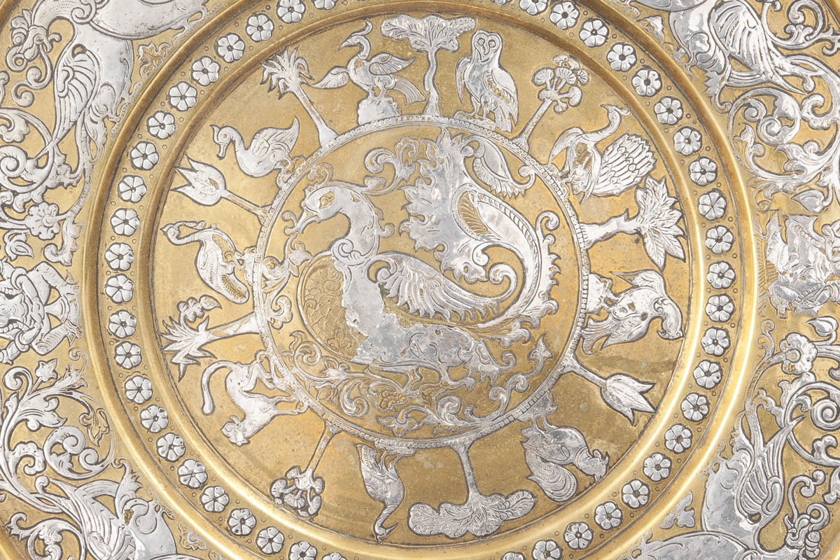 A Sri-Lankan silver inlaid brass temple dish