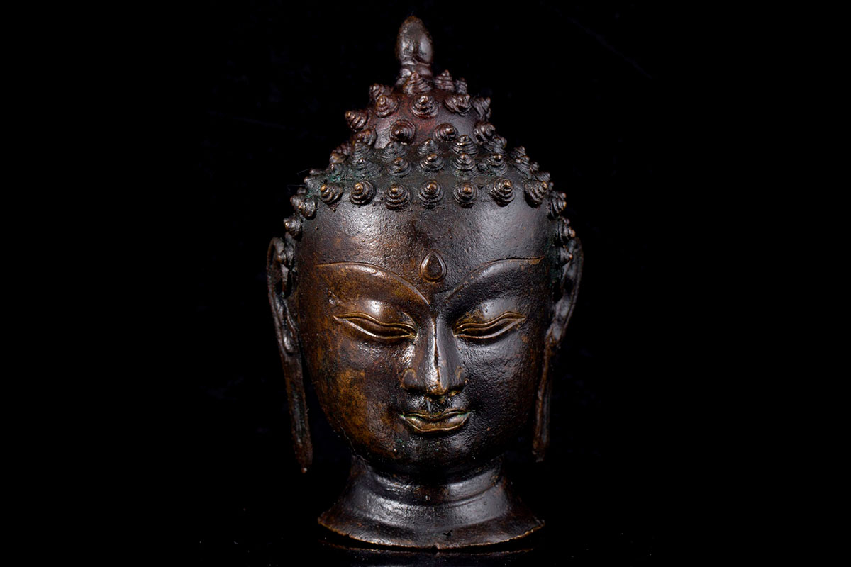 A 16th/17th century gilt bronze Mongolian hand